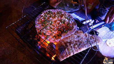touring saigon itineraries banh trang nuong